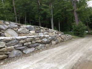 Stone Wall with Home Driveway